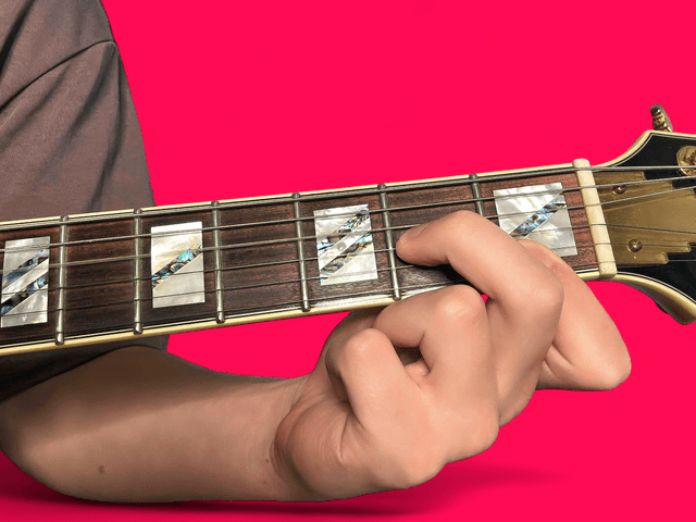 Dm7 guitar chord with finger positions