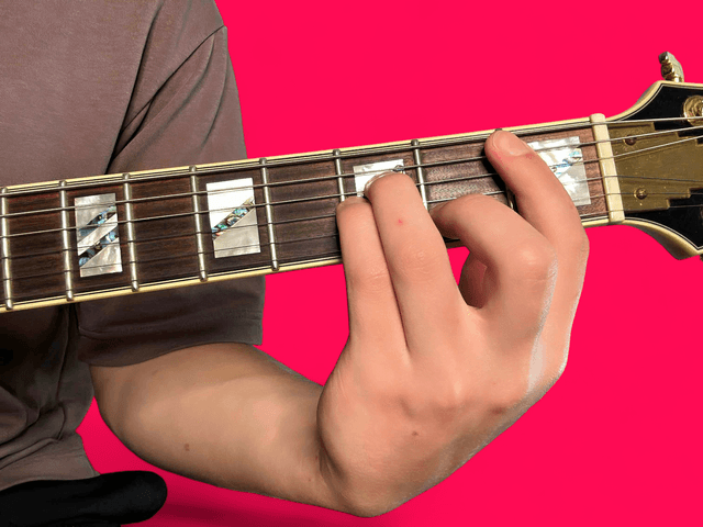 Bb minor guitar chord with finger positions