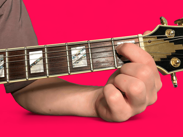 E minor over D# guitar chord with finger positions